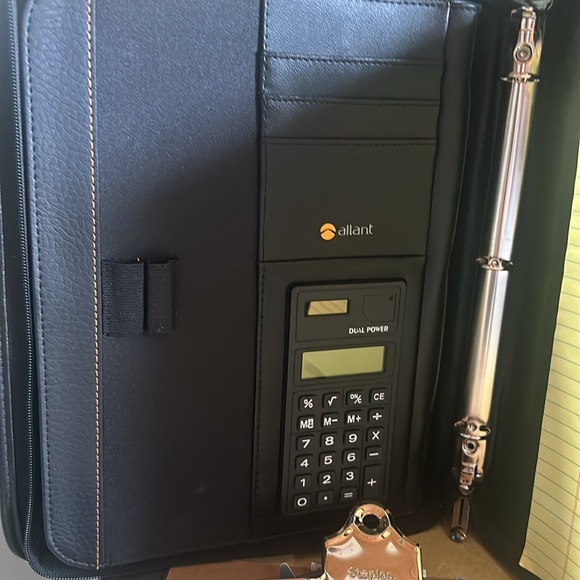 Allan’s  portfolio with calculator also with Staples clipboard unopened - Picture 2 of 9